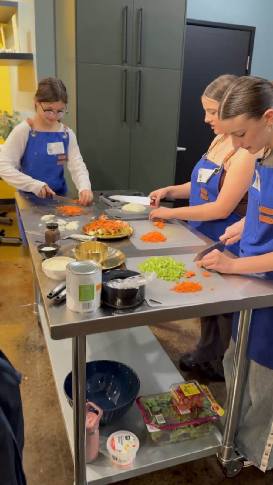 Young cooks working as a team in the Culinary League
