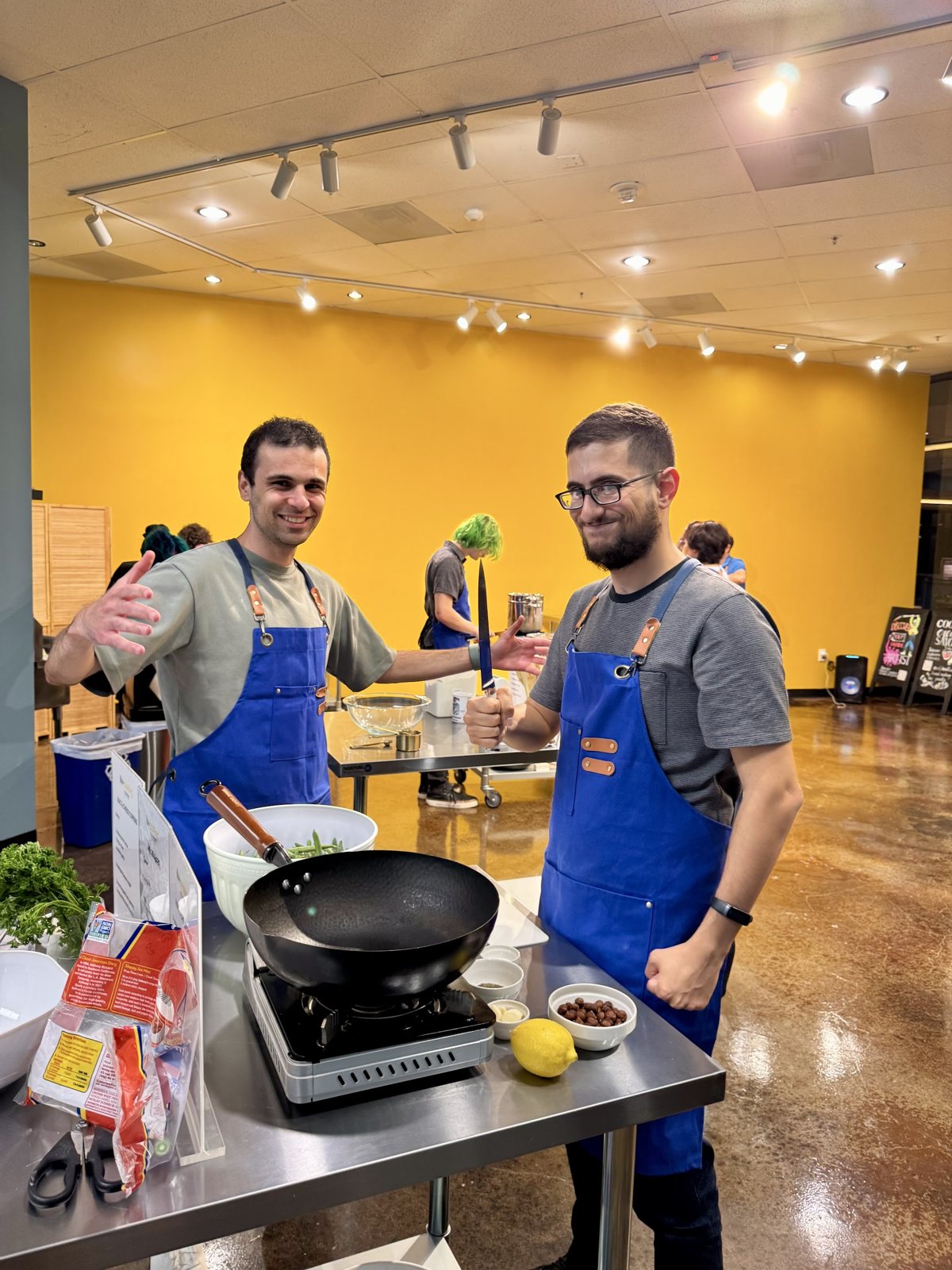 team building — a group mid-cook